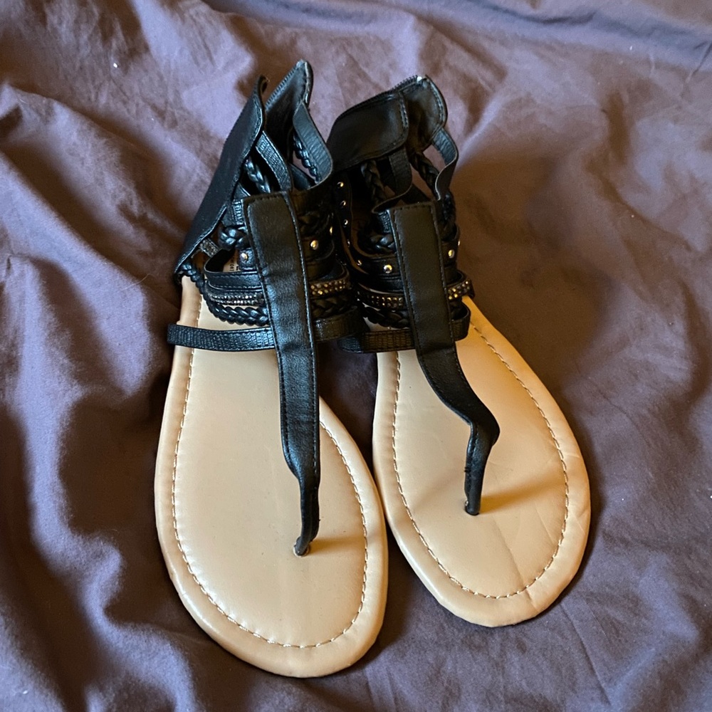 Flat black strap ankle sandals